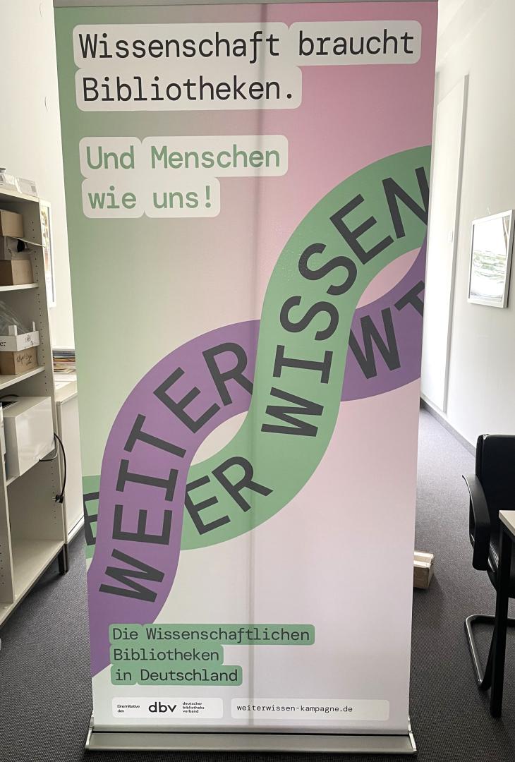 Soll Up Banner_Wissenschaft braucht Bibliotheken. Und Menschen wie uns.